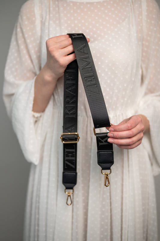 Plecu siksna ar logotipu Melna