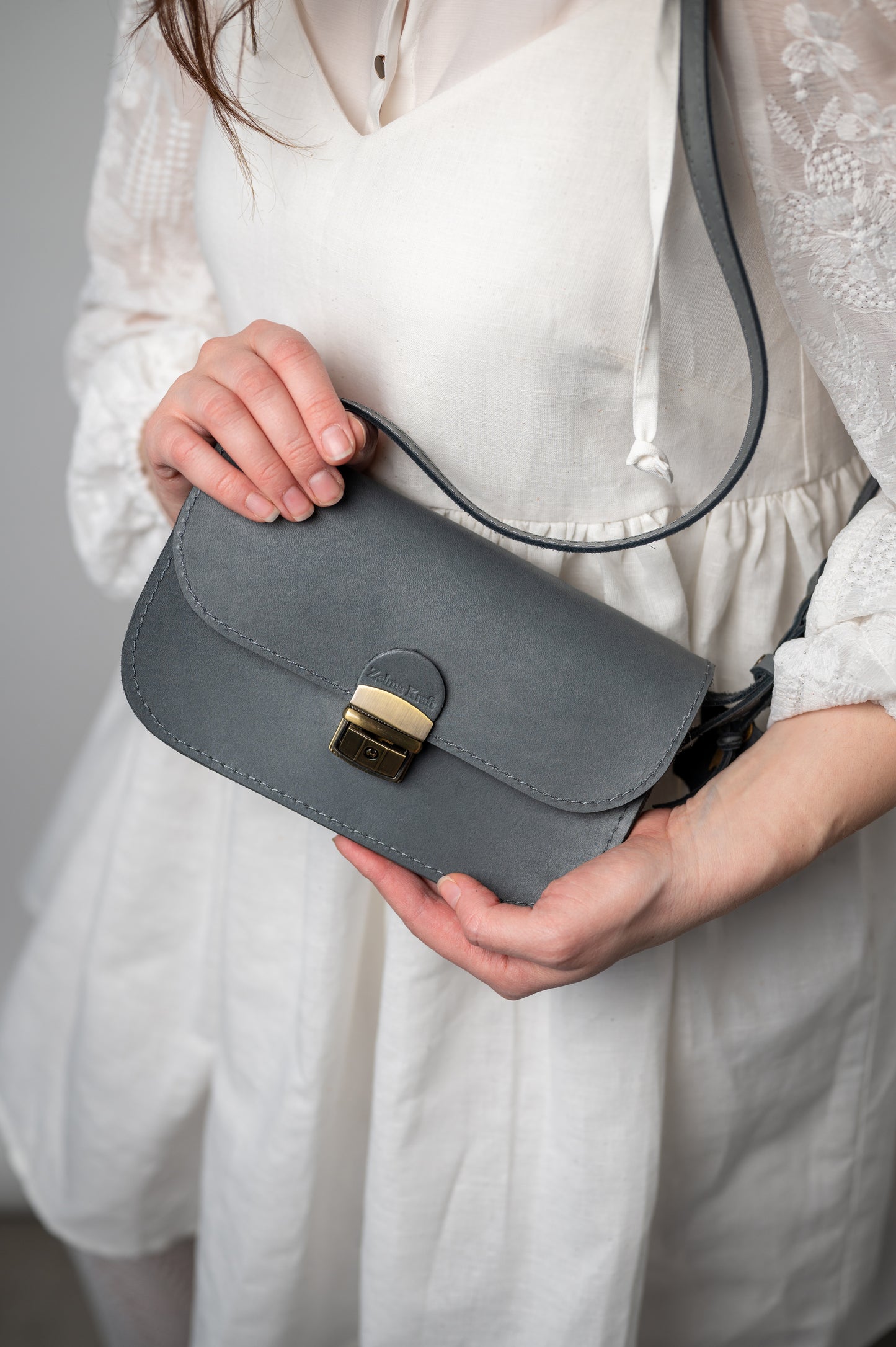 Saddle mazā soma Pelēka